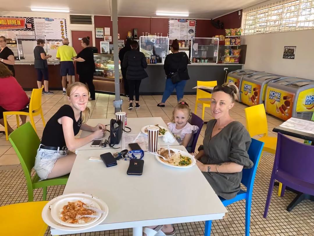 People sitting together sharing a meal