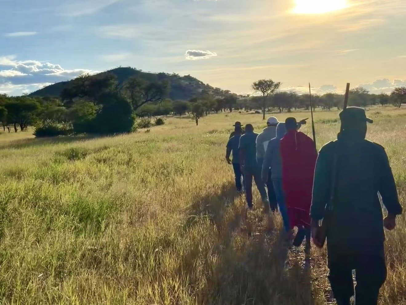 Guests on a guided walking safari across the plains