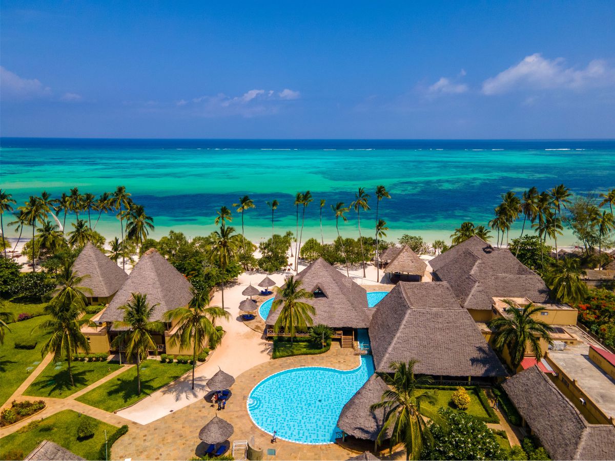 Aerial view of Neptune Pwani's white-sand beach and pools on the Zanzibar coast