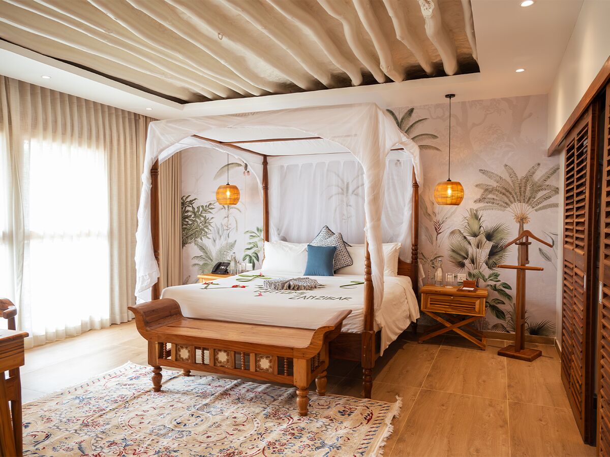An ocean-view suite interior at Neptune Pwani, Zanzibar
