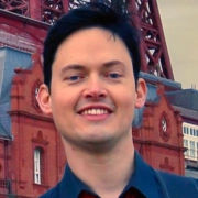 A head shot of Bryan, the lead singer