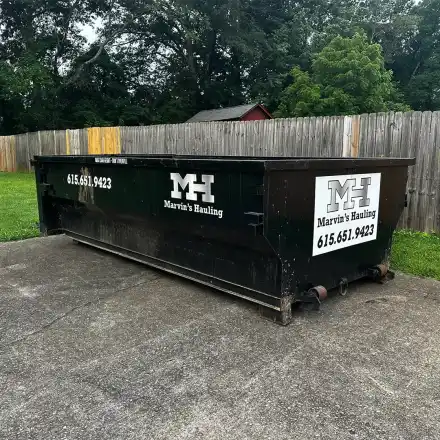 Marvin’s Hauling 13 yard dumpster on a residential driveway in Middle Tennessee