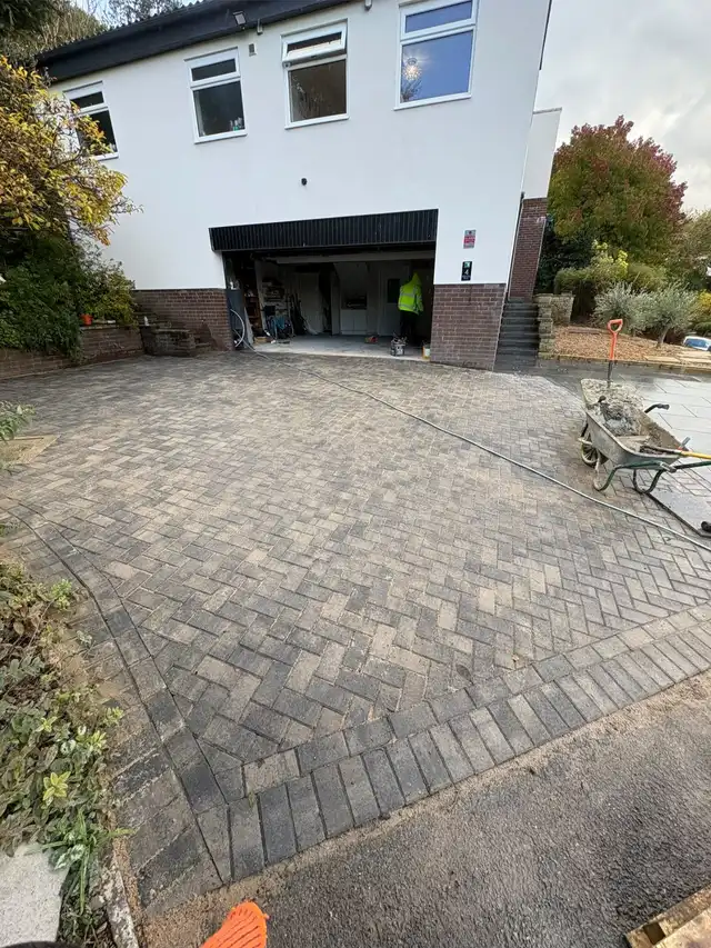 Driveway with white edged border in front of a house in Manchester