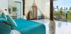 Master Suite (Sea View) at Ayurvie Weligama with canopy bed, balcony, and panoramic ocean views.