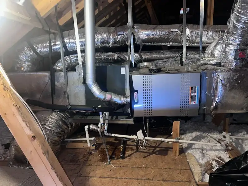 New furnace and ductwork installed in an attic