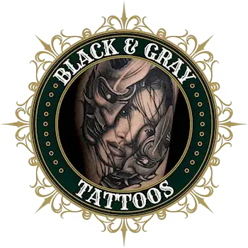 Black and gray realism tattoo by Alek the Saint in San Marcos, CA, displayed in a gold and green frame