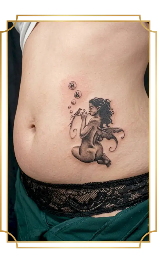 Fine line black and gray fairy tattoo blowing bubbles on the abdomen