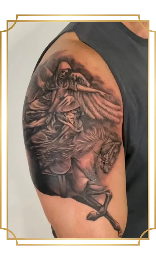 Black and gray grim reaper riding a horse tattoo on the upper arm