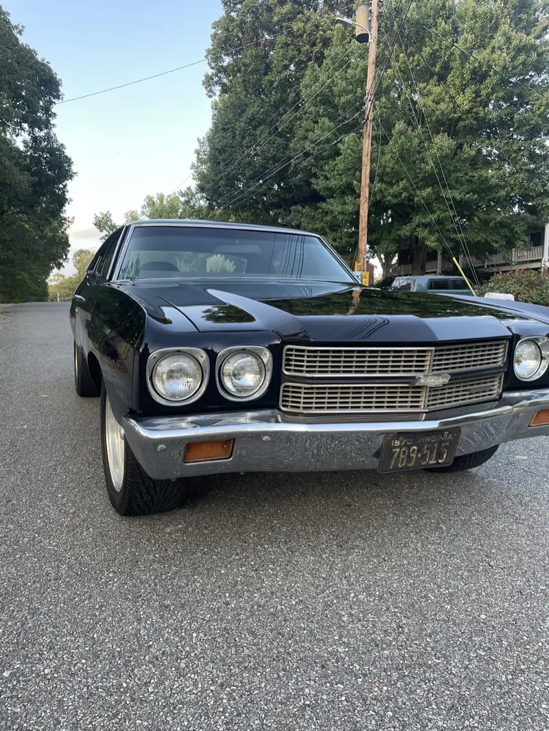 Black Chevy Chevelle after an exterior detail, paint glossy