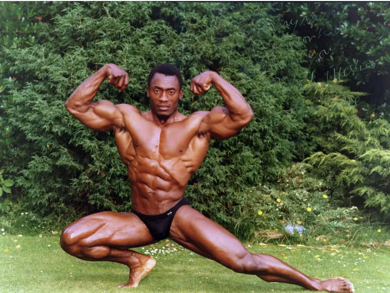 Ian Dowe in his competition days, hitting a front double biceps pose