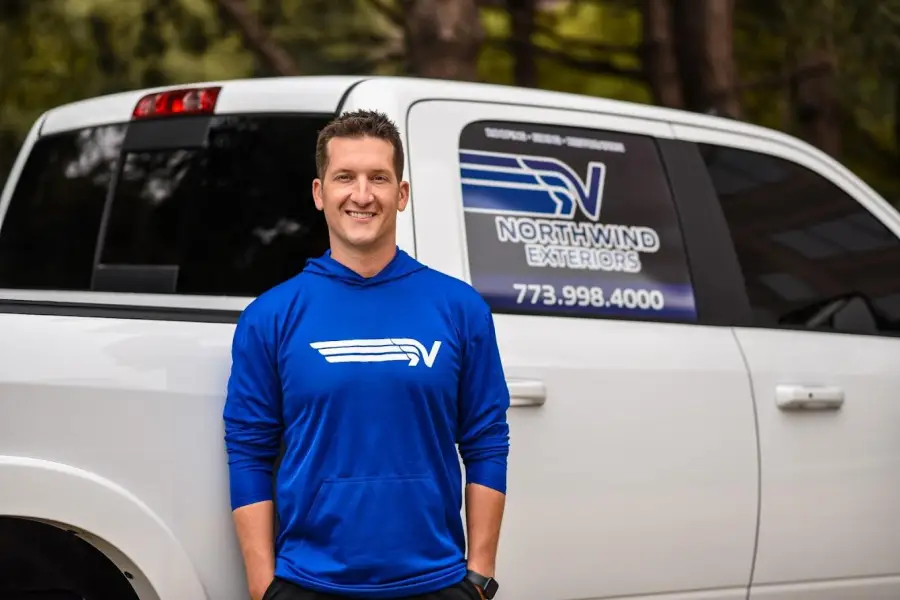 Joe with Northwind Exteriors vehicle