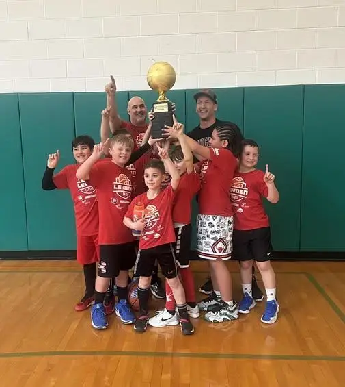 Joe coaching youth basketball