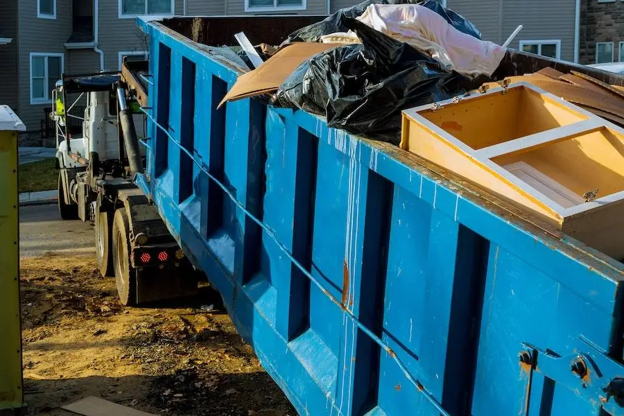 Commercial Junk Removal team clearing out an office space in Denver