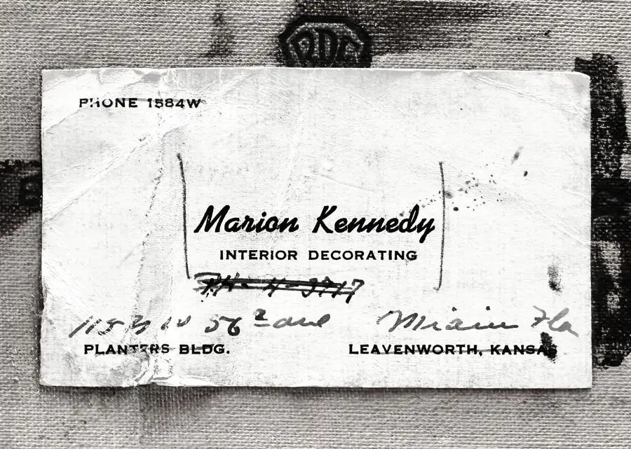 Marion Kennedy's business card showing the phone number 1584 W