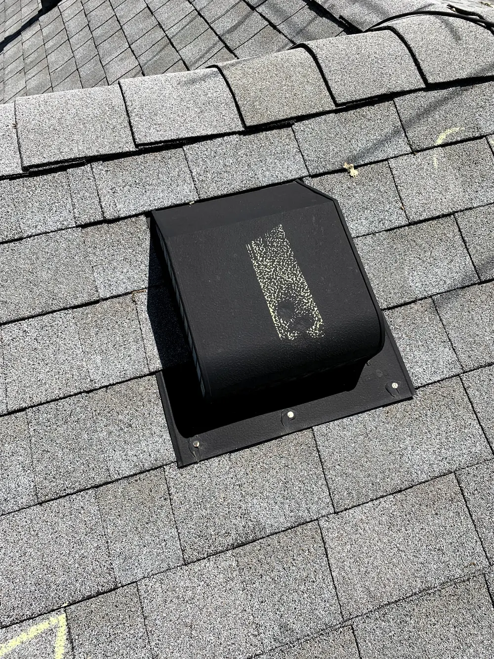 Roof vent on a shingle roof checked during a storm inspection