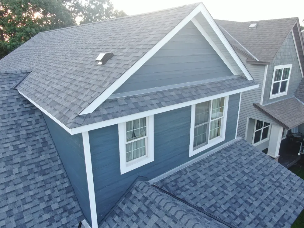 Front gable with new siding, trim and shingles