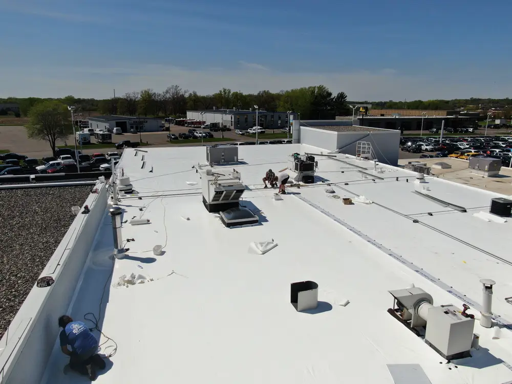 Repair King crew on a commercial roof replacement in Forest Lake, MN