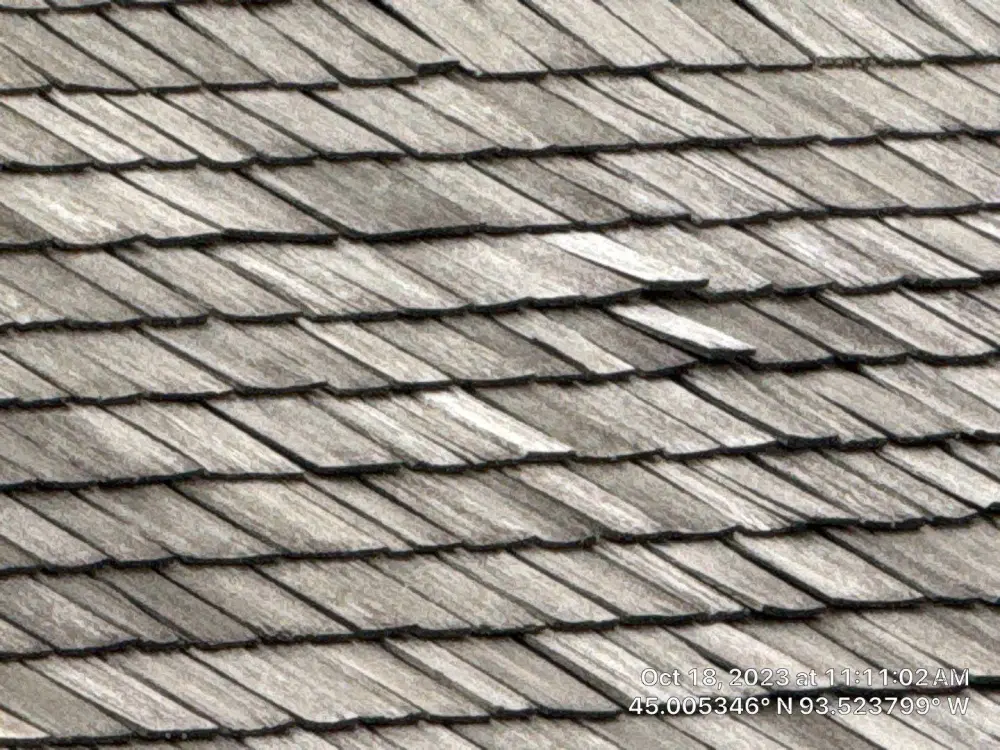 Hip ridge on a weathered cedar shake roof