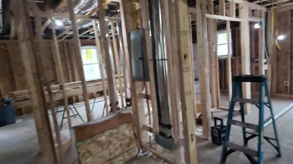 Home framing opened up during a fire restoration rebuild