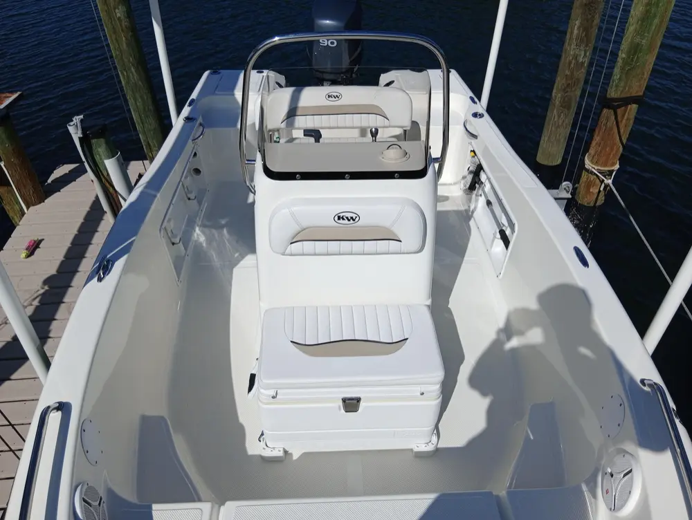Clean center console cockpit and seating at the dock