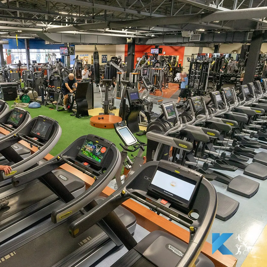 Cardio machines and the turf zone on the main floor at Klub 20