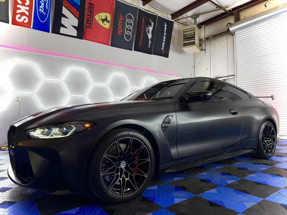 Dark BMW coupe with window tint at Venom Tint Acworth