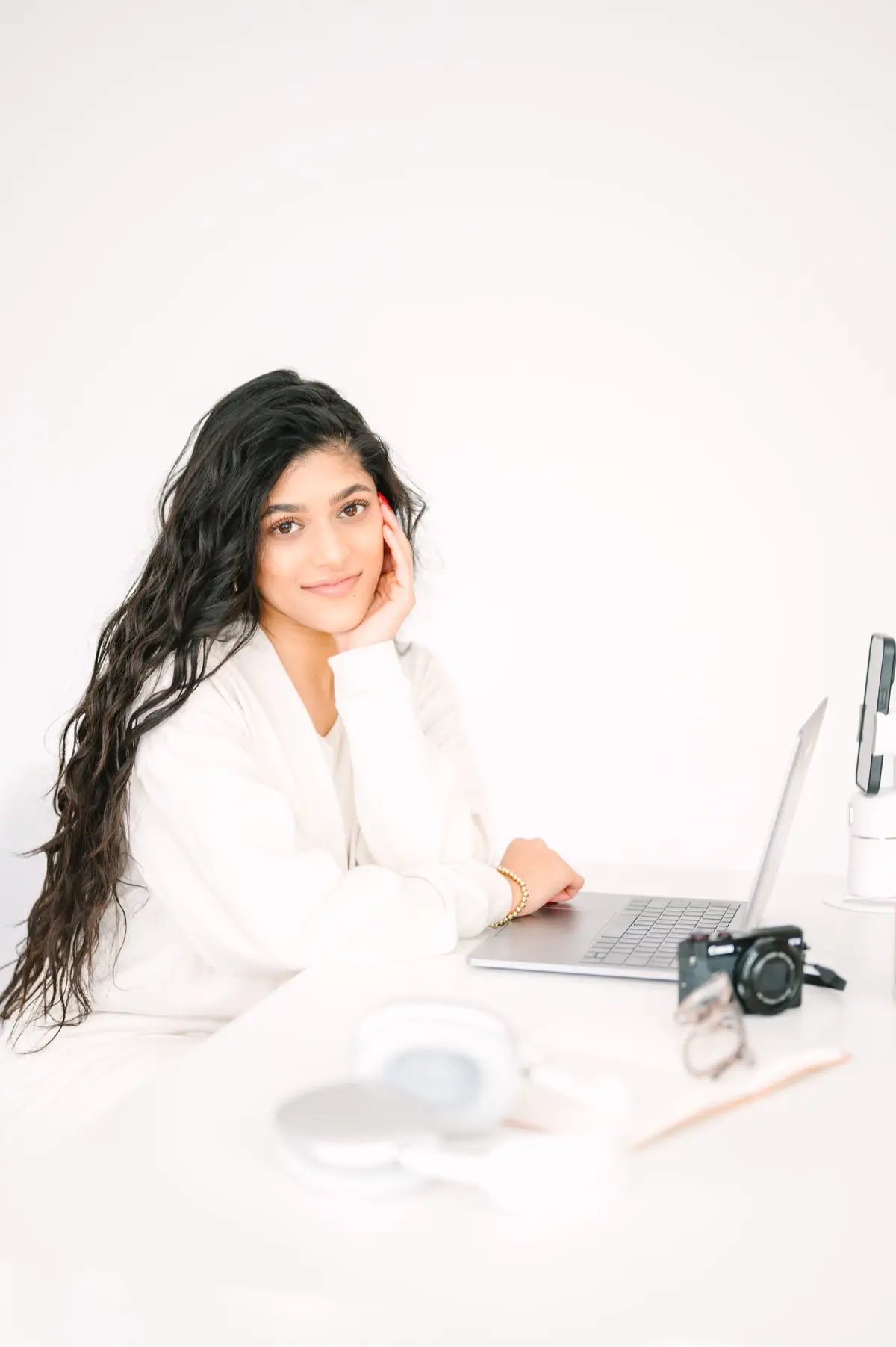 Amber Farooqui at her desk