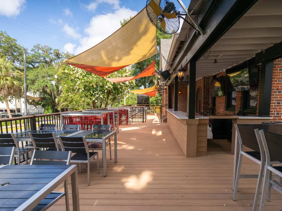 Patio deck seating under shade sails
