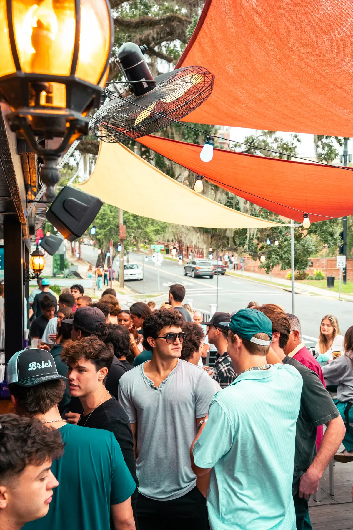 Packed patio crowd during the day