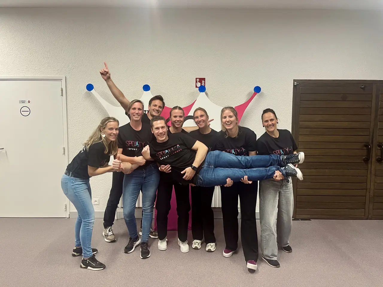Een groep mensen bij Sporty-x