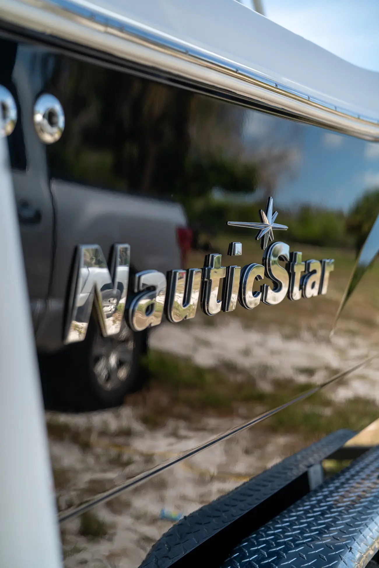 NauticStar hull lettering reflecting cleanly after coating