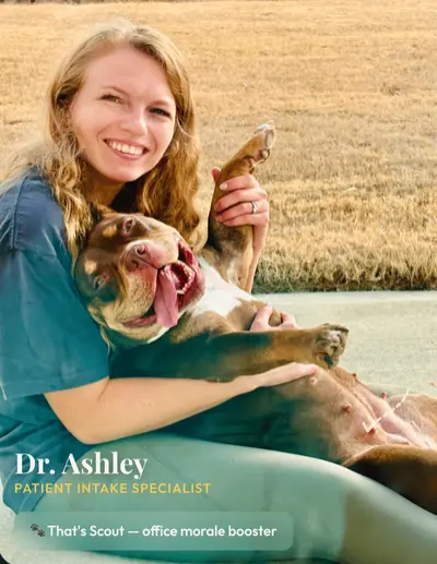 Dr. Ashley, PT, DPT, OCS, Patient Intake Specialist at Pro+Kinetix, with Scout the clinic dog