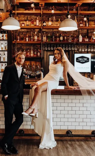 A couple at the handcrafted bar inside The 3 Ten