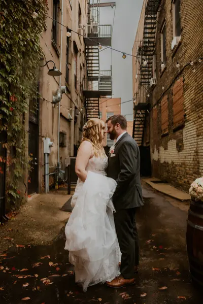 A couple in the alley beside The 3 Ten