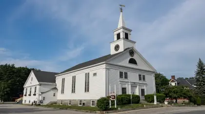 White church and steeple in Pelham, New Hampshire.