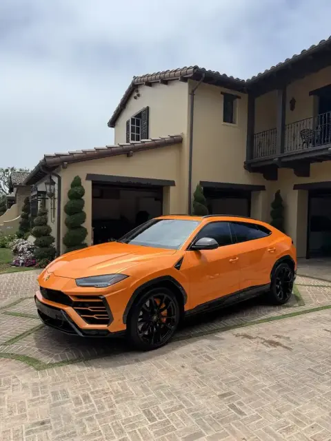 Orange Lamborghini Urus after a full exterior detail