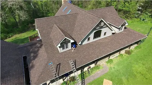 Fairfield, PA home after roof replacement, new shingles visible from above.