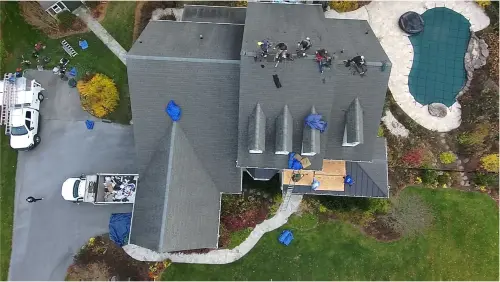 Existing roof in Finksburg, MD before replacement, showing worn shingles.
