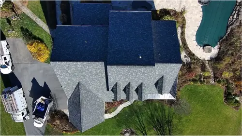 Completed roof replacement in Finksburg, MD, showing new shingle roof from above.