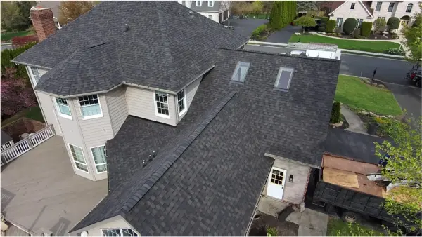Completed roof replacement in Mechanicsburg, PA, side aerial view of new roof.