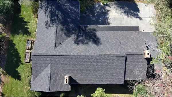 Completed roof replacement in Dillsburg, PA, aerial view of new shingles.
