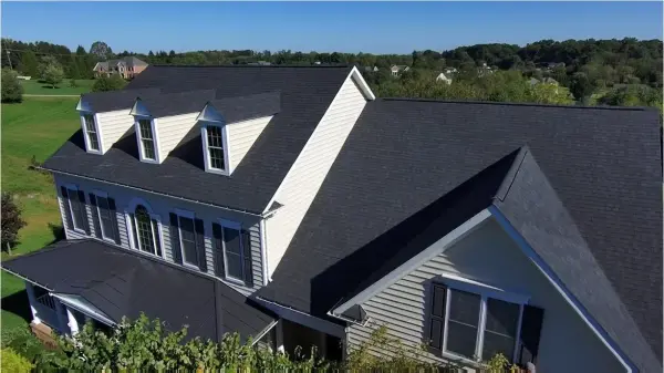 Finished roof replacement in Finksburg, MD, side view of completed roof.