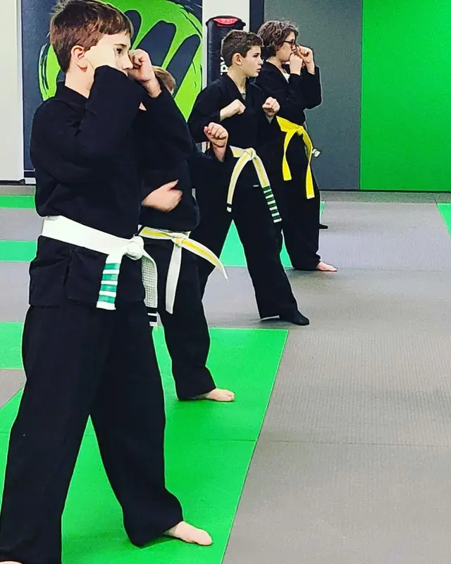 Student practicing a guard stance at Fusion Martial Arts