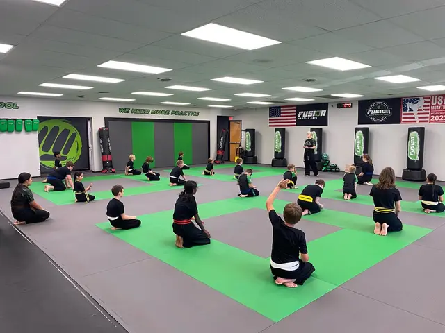 Instructor leading a kids class at Fusion Martial Arts in Bloomington