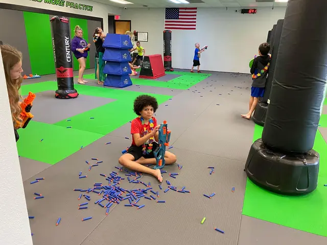 Kids playing a martial arts game in class at Fusion