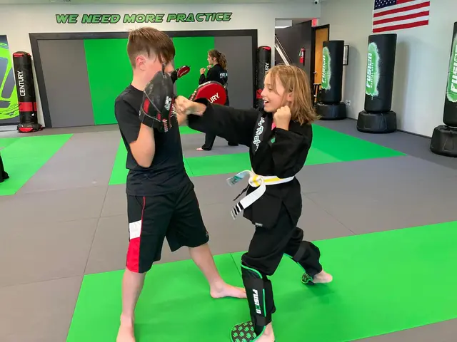 Kids pad work training at Fusion Martial Arts