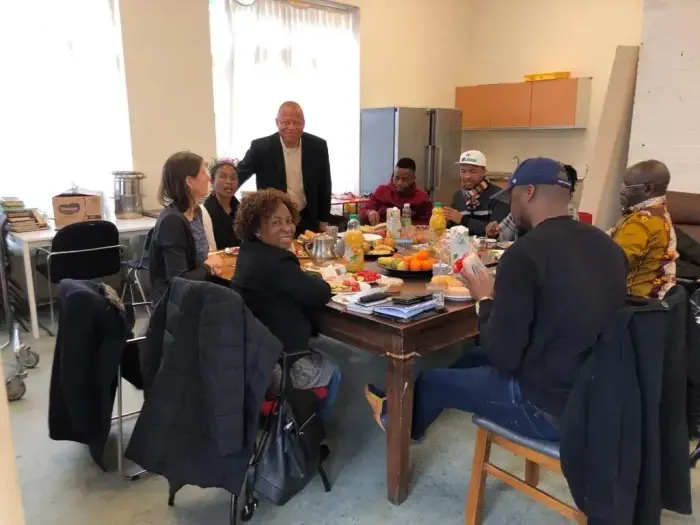 Members sharing a meal