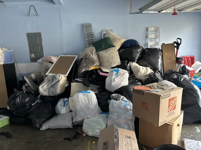 Full garage cleanout before junk removal by KD Junk