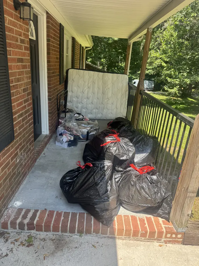 Porch cleanout before junk removal by KD Junk