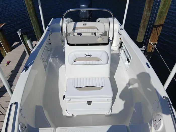 Clean center console cockpit and seating at the dock